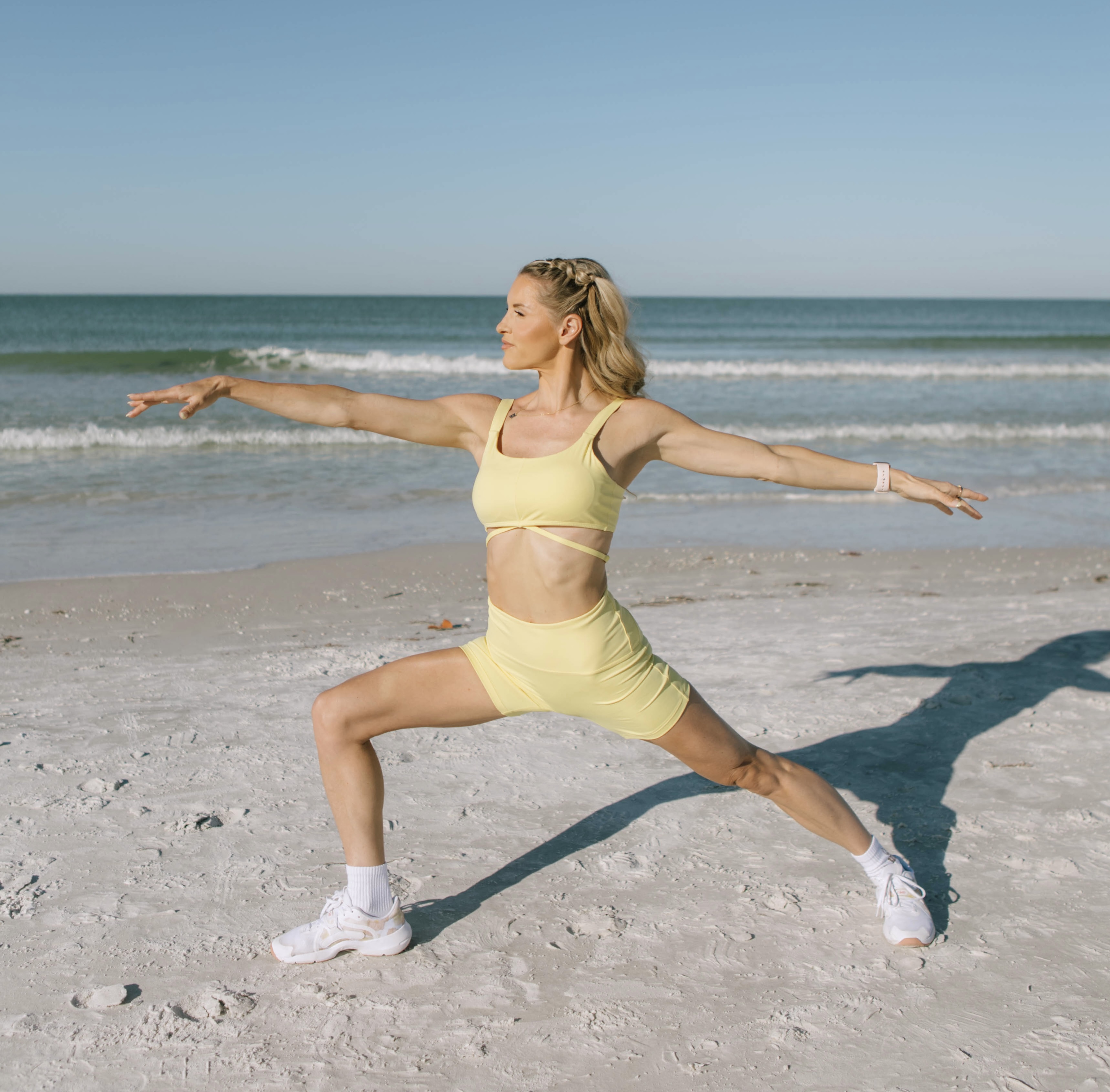 Rebecca Louise — beach warrior pose, pre-cropped